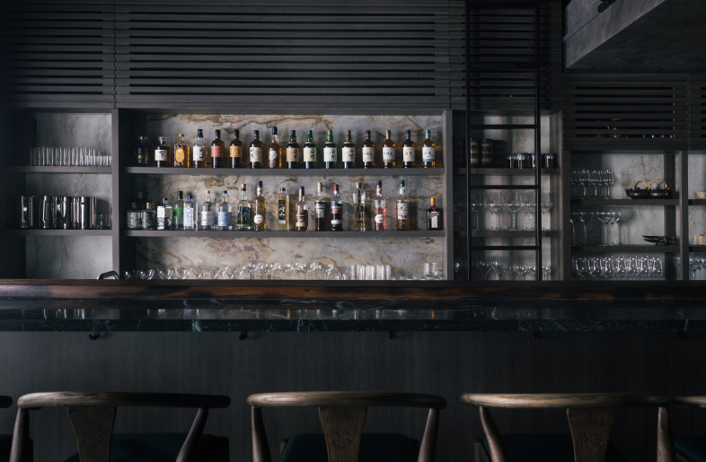 The 11-meter bar extends to the end of the restaurant, offering seating for 17 diners. - Finbarr Fallon