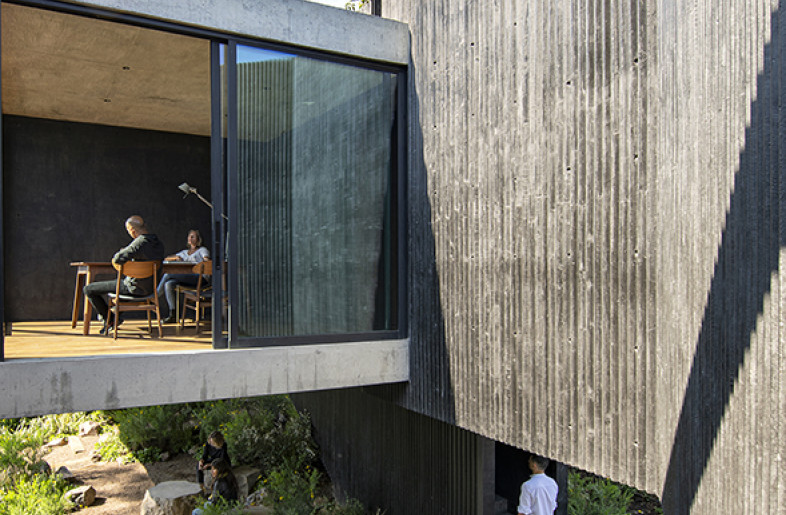 Interior View, patio and office at the background. - Jaime Navarro