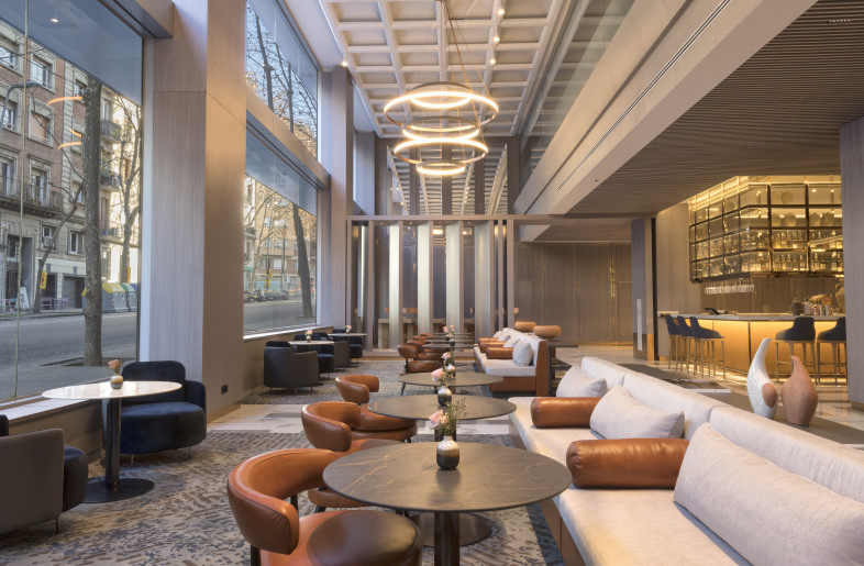 Statement lighting in double height areas to create impact - Vigonarte Studio