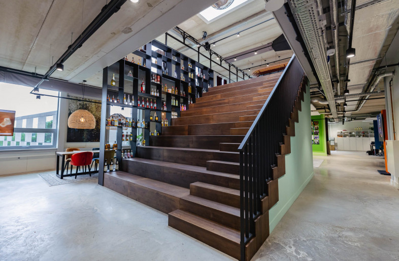 Stairs with presentation wall beverages - Laura Smithjes