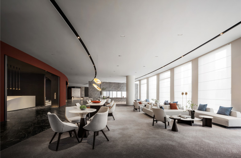 Curve French glass windows maximally bring the outdoor scenes into the room, which echo indoor light&shadow, opening space vision and offering better experience for fun of communication. - Qiwen Photography