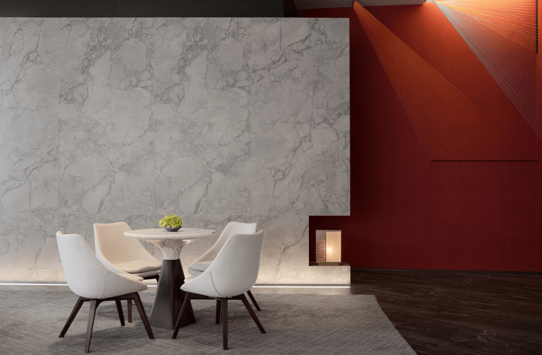 Low and fashionable cafe area is decorated with natural floriculture. Furthermore, it makes the negotiation more free.Geometric light&shadow outlines the beauty of space architectural art. - Qiwen Photography
