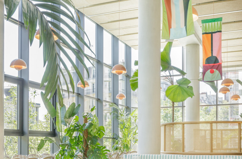 Hanging Flowerpot lamps punctuate the ceiling. - Rodrigo Apolaya
