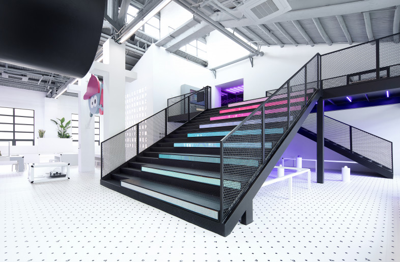Black steel staircase with animated LED light lines can be used for lectures or gatherings. - COORDINATION ASIA