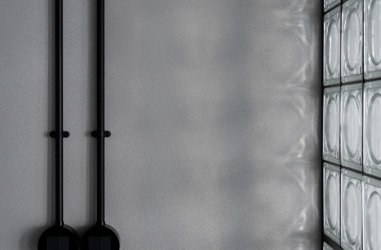 detail of light on sand textured wall finish - Ilya Ivanov