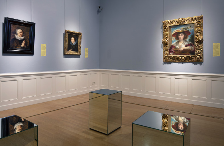 Exhibit hall with paintings by Jordaens and mirror chairs - Arie de Leeuw